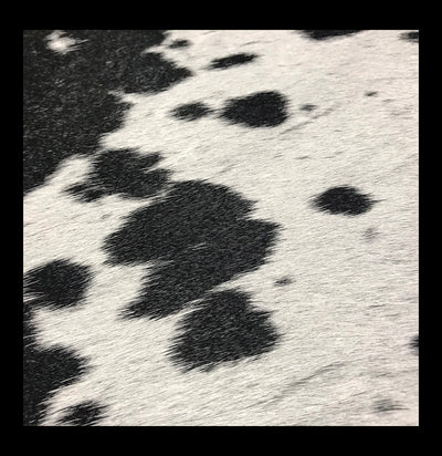 Black and White spotty Brazilian Cowhide-Taxidermy-Chesterfield-PaxtonGate